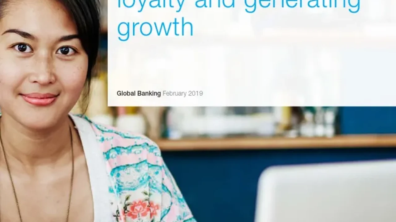 Close up on a plate of mashed potatoes, topped with baked pork chops with cream of mushroom soup, and a side of green beans.