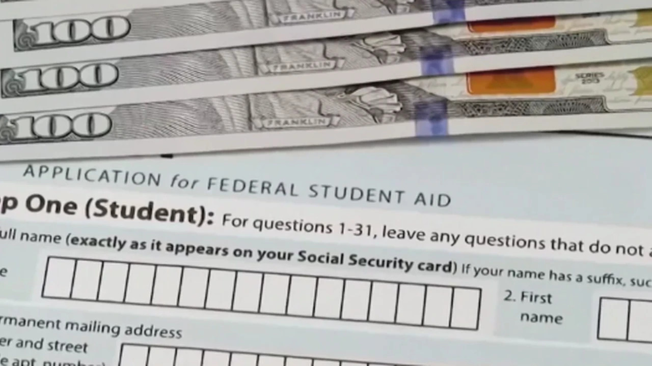 Two mint chocolate milkshakes with whipped cream and green sprinkles.