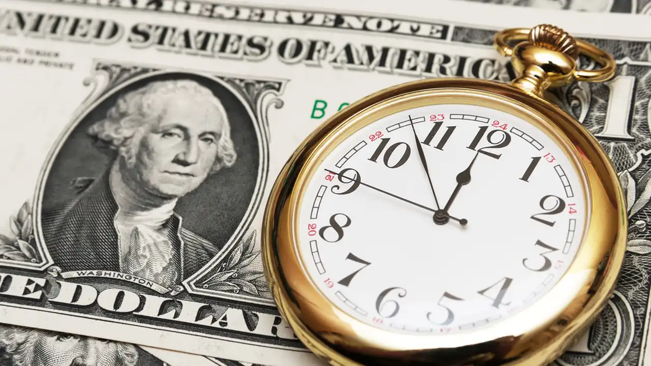 Two mint chocolate milkshakes with whipped cream and green sprinkles.